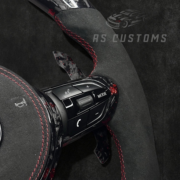 RS Customs BMW F-Series custom steering wheel with forged carbon fiber, customizable colored flakes, Alcantara grips, integrated LED display, optional heating and paddle shifters.