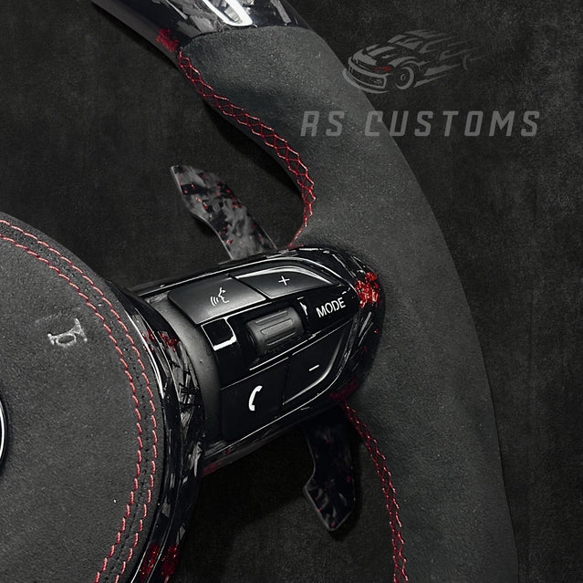 RS Customs BMW F-Series custom steering wheel with forged carbon fiber, customizable colored flakes, Alcantara grips, integrated LED display, optional heating and paddle shifters.