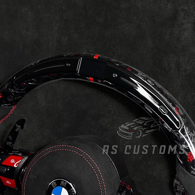 RS Customs BMW F-Series custom steering wheel with forged carbon fiber, customizable colored flakes, Alcantara grips, integrated LED display, optional heating and paddle shifters.