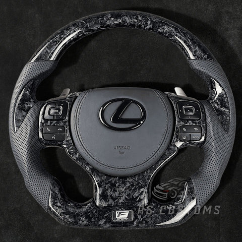 RS Customs 2017+ Lexus IS and RC forged carbon fiber custom steering wheel with perforated leather grips, forged carbon trim and optional custom airbag cover.