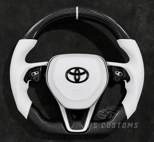 RS Customs 2018+ Toyota Corolla and Camry carbon fiber custom steering wheel with white leather grips and optional custom airbag cover in OEM+ sporty design.