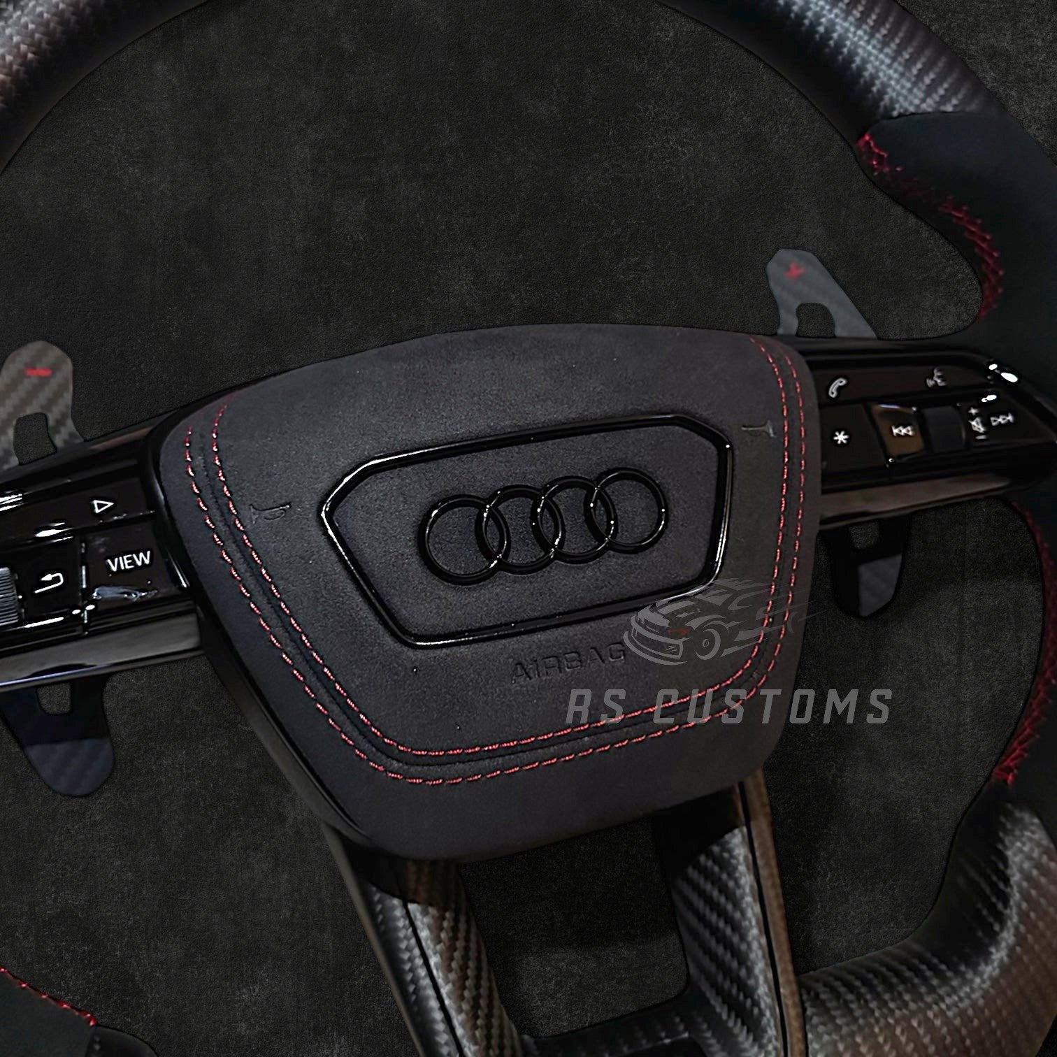 RS Customs Audi e-tron GT RS and RS C8 custom steering wheel with matte carbon fiber, Alcantara grips and optional heating for RS6, RS7, RSQ8 and e-tron models from 2019+.