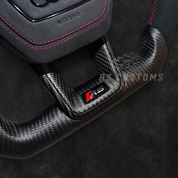 RS Customs Audi e-tron GT RS and RS C8 custom steering wheel with matte carbon fiber, Alcantara grips and optional heating for RS6, RS7, RSQ8 and e-tron models from 2019+.
