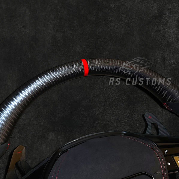 RS Customs Audi e-tron GT RS and RS C8 custom steering wheel with matte carbon fiber, Alcantara grips and optional heating for RS6, RS7, RSQ8 and e-tron models from 2019+.