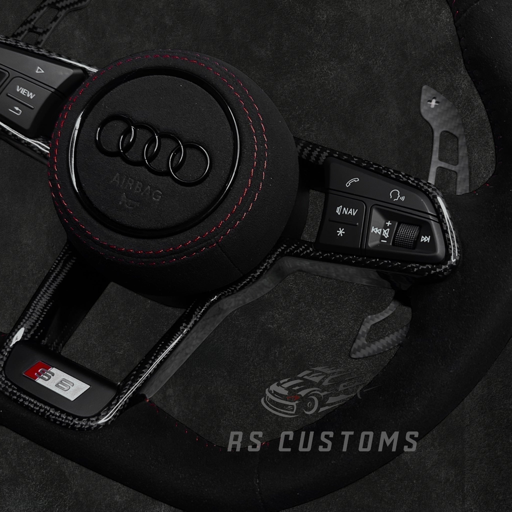 RS Customs Audi R8 and TT custom steering wheel with full Alcantara finish, carbon fiber trim, optional complete airbag, heating and OEM functionality for Audi performance models.