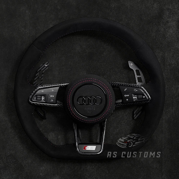RS Customs Audi R8 and TT custom steering wheel with full Alcantara finish, carbon fiber trim, optional complete airbag, heating and OEM functionality for Audi performance models.