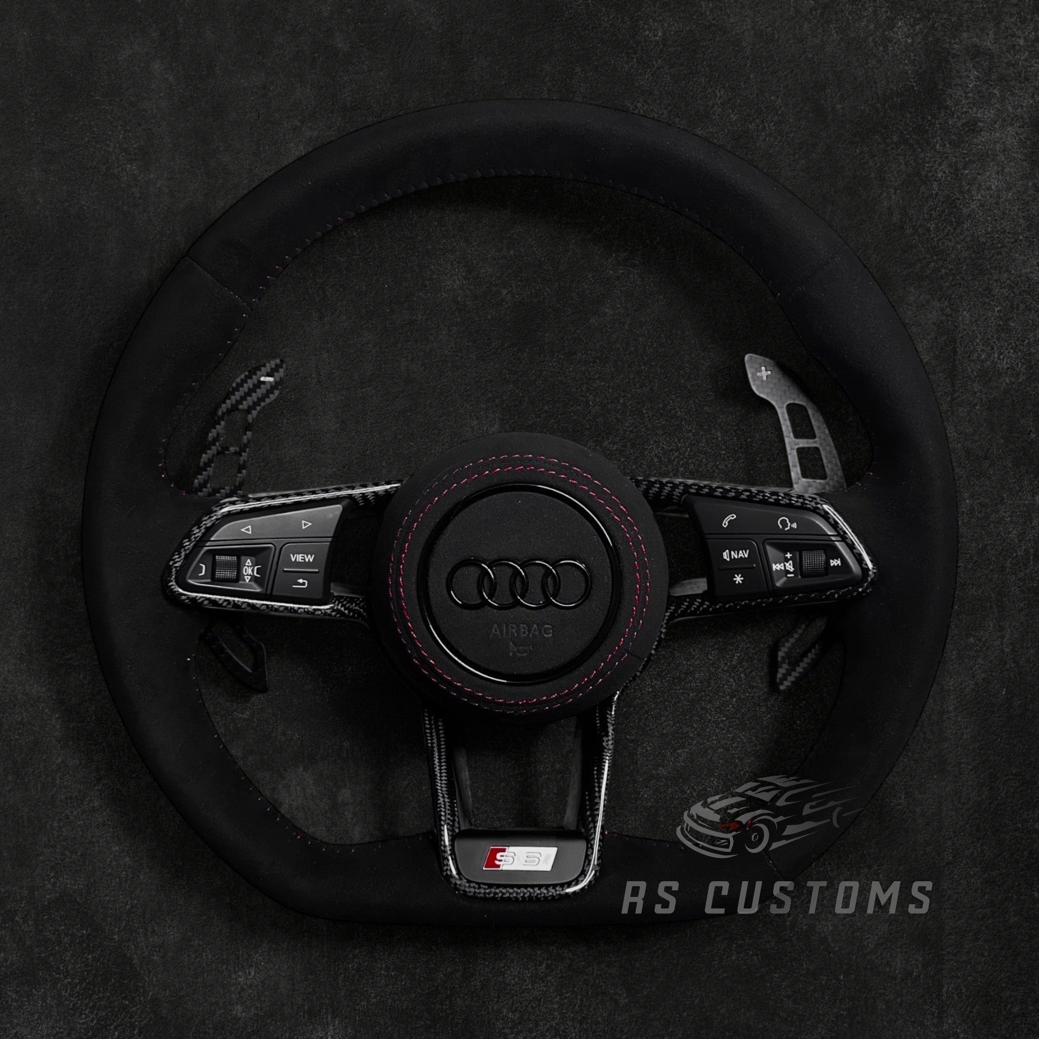 RS Customs Audi R8 and TT custom steering wheel with full Alcantara finish, carbon fiber trim, optional complete airbag, heating and OEM functionality for Audi performance models.