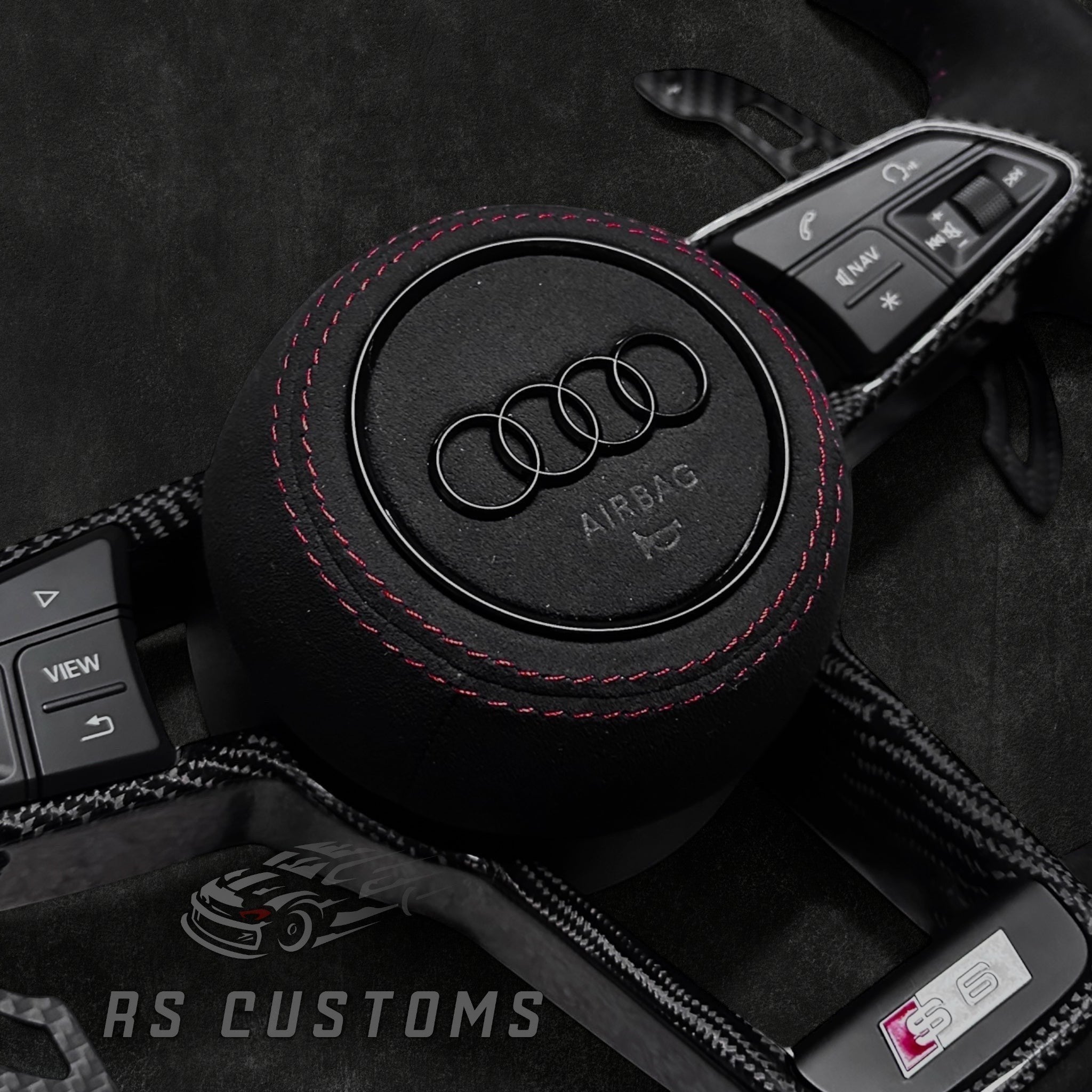 RS Customs Audi R8 and TT custom steering wheel with full Alcantara finish, carbon fiber trim, optional complete airbag, heating and OEM functionality for Audi performance models.