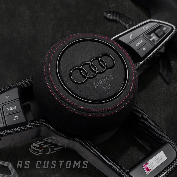RS Customs Audi R8 and TT custom steering wheel with full Alcantara finish, carbon fiber trim, optional complete airbag, heating and OEM functionality for Audi performance models.