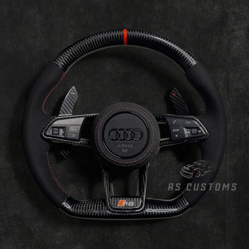 RS Customs Audi R8 and TT custom steering wheel with carbon fiber construction, Alcantara grips, carbon fiber trim, optional complete airbag and OEM functionality for Audi performance models.