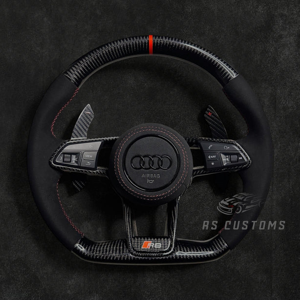 RS Customs Audi R8 and TT custom steering wheel with carbon fiber construction, Alcantara grips, carbon fiber trim, optional complete airbag and OEM functionality for Audi performance models.