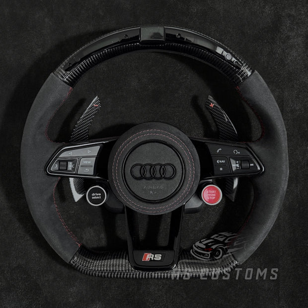 RS Customs Audi R8 TT TTS TT RS custom steering wheel with carbon fiber, Alcantara grips, LED display, Drive Select button and Engine Start/Stop controls compatible with Audi models from 2014+.
