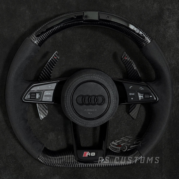 RS Customs Audi R8 TT TTS TT RS custom steering wheel with carbon fiber, Alcantara grips, LED display and black trim details compatible with Audi models from 2014+.