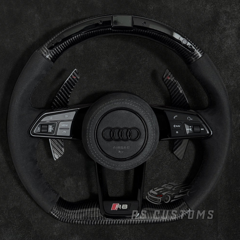 RS Customs Audi R8 TT TTS TT RS custom steering wheel with carbon fiber, Alcantara grips, LED display and black trim details compatible with Audi models from 2014+.