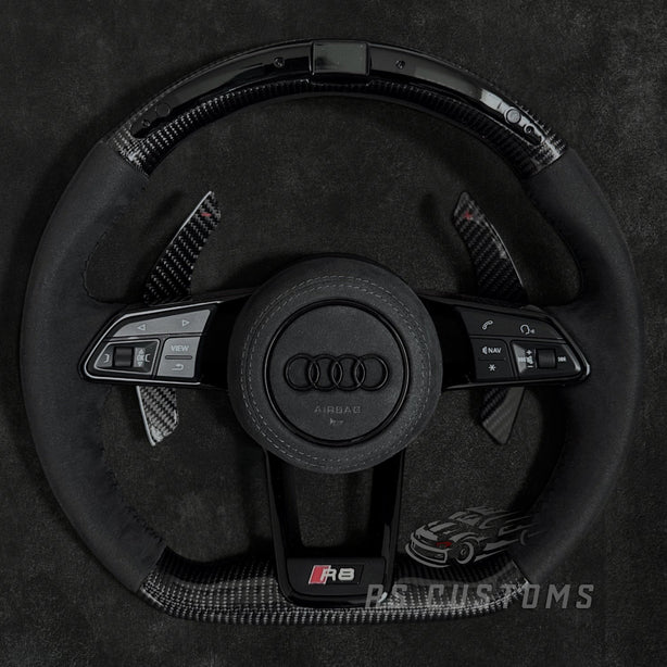 RS Customs Audi R8 TT TTS TT RS custom steering wheel with carbon fiber, Alcantara grips, LED display and black trim details compatible with Audi models from 2014+.