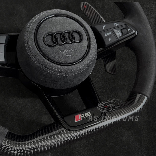 RS Customs Audi R8 TT TTS TT RS custom steering wheel with carbon fiber, Alcantara grips, LED display and black trim details compatible with Audi models from 2014+.