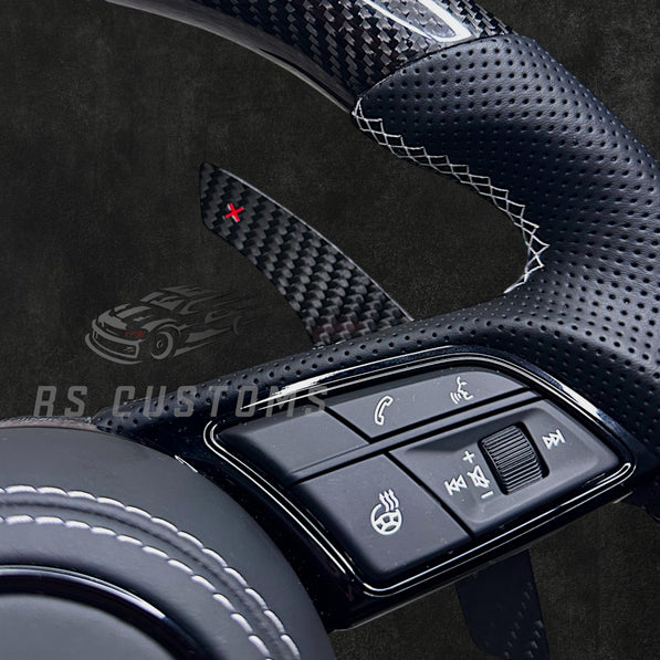 RS Customs Audi RS B9 custom steering wheel with carbon fiber, leather grips, custom center stripe and chrome delete trim for RS3, RS4, RS5, RS6, RS7 and other Audi models.