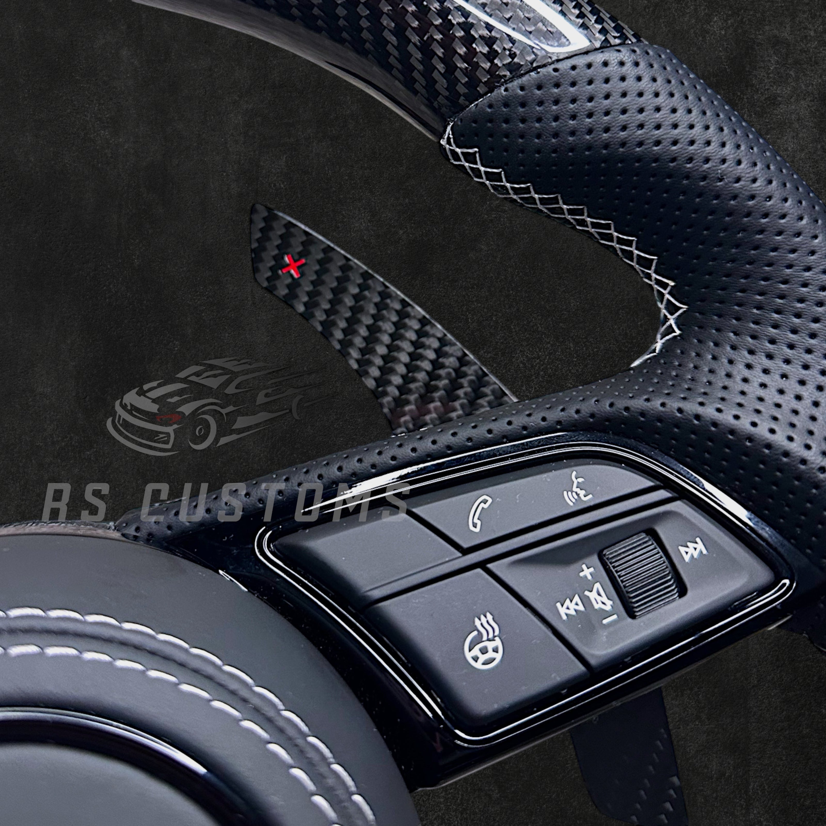 RS Customs Audi RS B9 custom steering wheel with carbon fiber, leather grips, custom center stripe and chrome delete trim for RS3, RS4, RS5, RS6, RS7 and other Audi models.