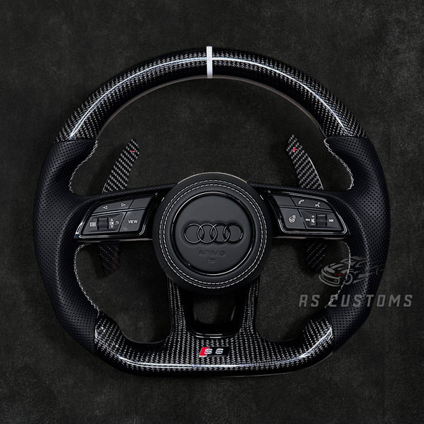RS Customs Audi RS B9 custom steering wheel with carbon fiber, leather grips, custom center stripe and chrome delete trim for RS3, RS4, RS5, RS6, RS7 and other Audi models.