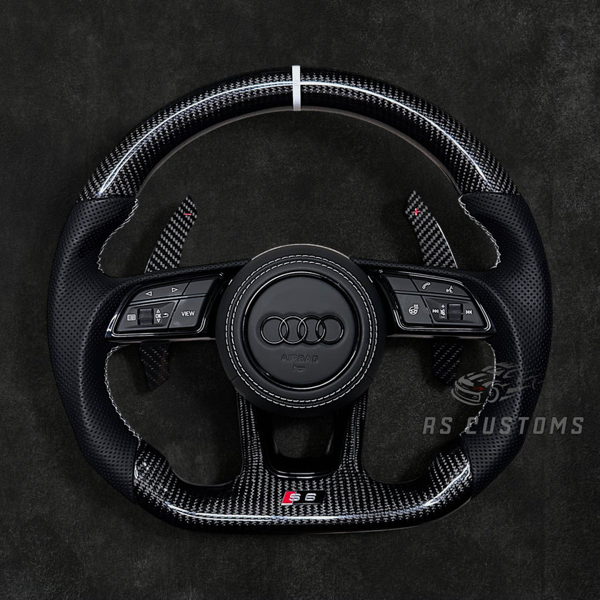 RS Customs Audi RS B9 custom steering wheel with carbon fiber, leather grips, custom center stripe and chrome delete trim for RS3, RS4, RS5, RS6, RS7 and other Audi models.