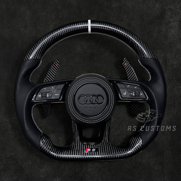 RS Customs Audi RS B9 custom steering wheel with carbon fiber, leather grips, custom center stripe and chrome delete trim for RS3, RS4, RS5, RS6, RS7 and other Audi models.
