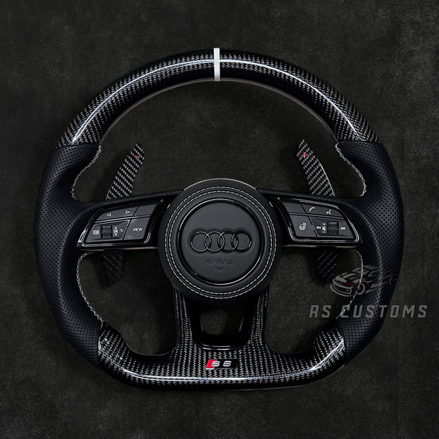 RS Customs Audi RS B9 custom steering wheel with carbon fiber, leather grips, custom center stripe and chrome delete trim for RS3, RS4, RS5, RS6, RS7 and other Audi models.
