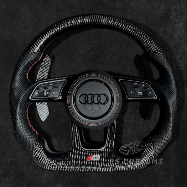 RS Customs Audi RS B9-style custom steering wheel with carbon fiber, perforated leather grips and optional heating for Audi A, S, RS, Q and R models from 2012+.