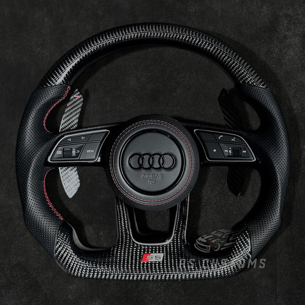 RS Customs Audi RS B9-style custom steering wheel with carbon fiber, perforated leather grips and optional heating for Audi A, S, RS, Q and R models from 2012+.