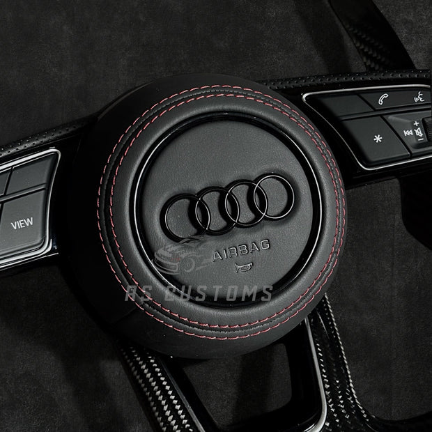 RS Customs Audi RS B9-style custom steering wheel with carbon fiber, perforated leather grips and optional heating for Audi A, S, RS, Q and R models from 2012+.