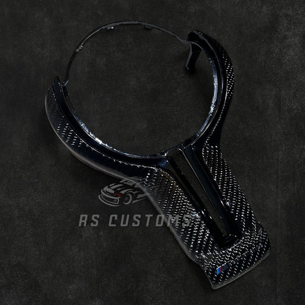 RS Customs BMW F-Series carbon fiber steering wheel cover with customizable center color for F20, F30, F80, F82 and other BMW F-Series models.