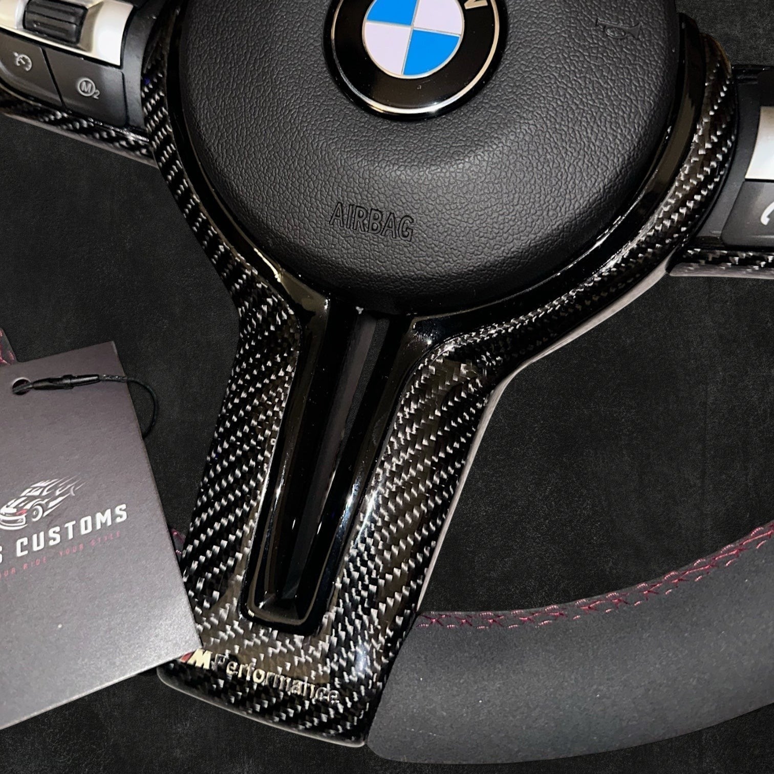 RS Customs BMW F-Series carbon fiber steering wheel cover with customizable center color for F20, F30, F80, F82 and other BMW F-Series models.
