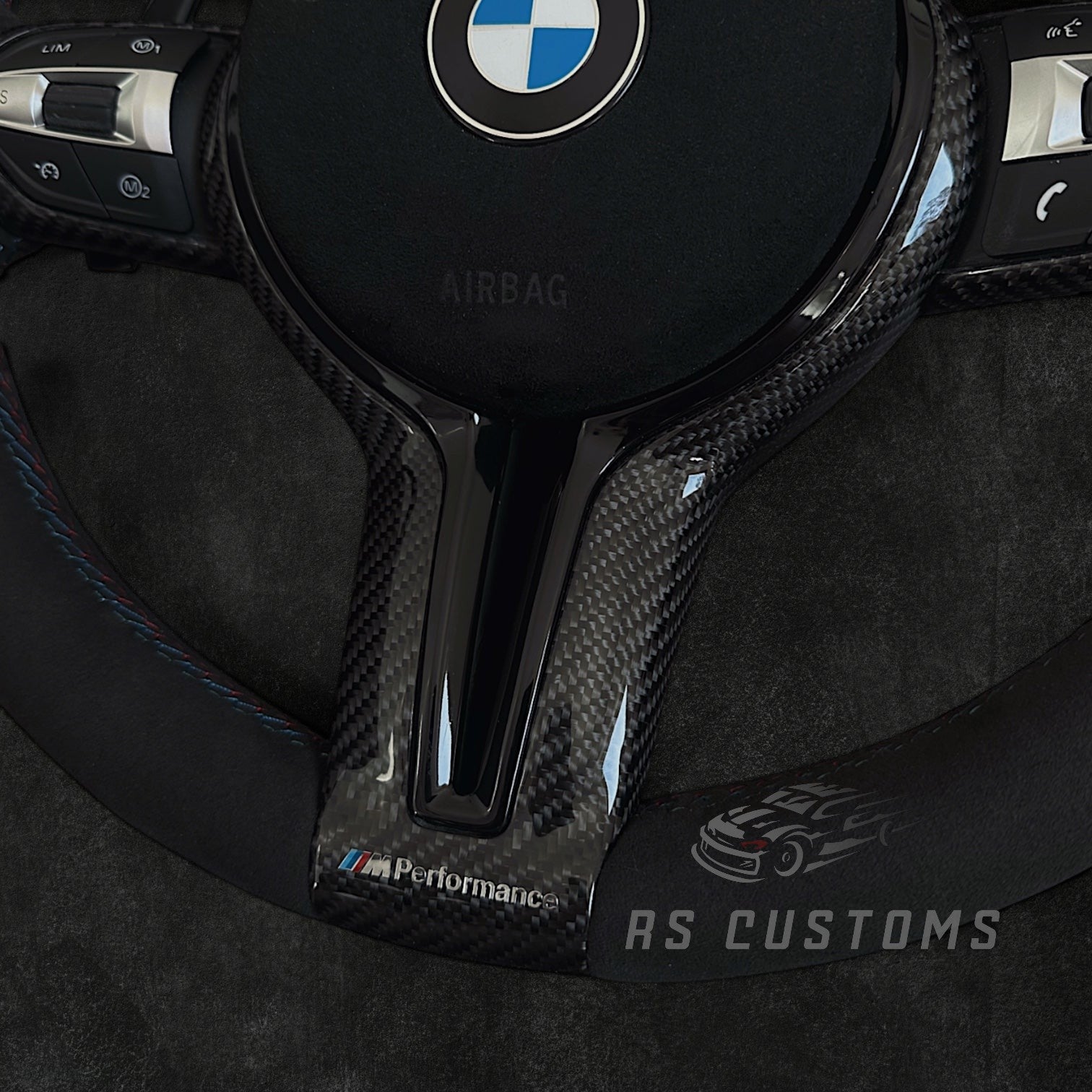 RS Customs BMW F-Series CS-style custom steering wheel with Alcantara, CS stripe, carbon fiber trim, optional Alcantara airbag cover, heating support and paddle shifter compatibility.