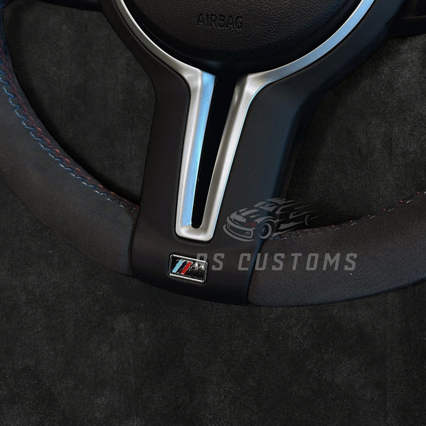 RS Customs BMW F-Series Custom Alcantara steering wheel with customizable center stripe, optional Alcantara airbag cover, heating support and paddle shifter compatibility.