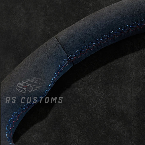 RS Customs BMW F-Series Custom Alcantara steering wheel with customizable center stripe, optional Alcantara airbag cover, heating support and paddle shifter compatibility.