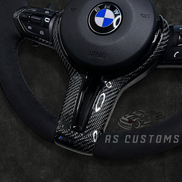 RS Customs BMW F-Series custom steering wheel with full Alcantara, carbon fiber details, integrated LED display, optional complete airbag, heating and paddle shifters.