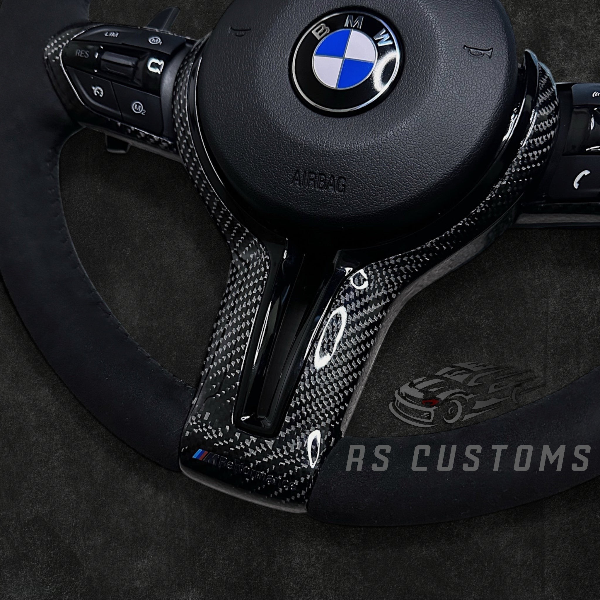 RS Customs BMW F-Series custom steering wheel with full Alcantara, carbon fiber details, integrated LED display, optional complete airbag, heating and paddle shifters.