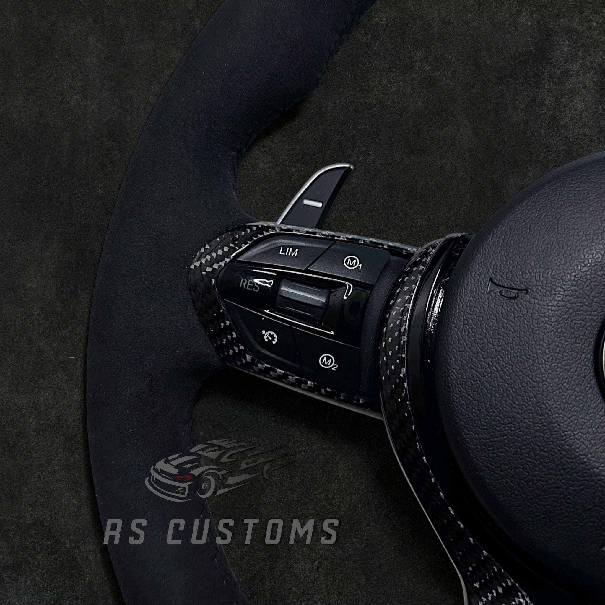 RS Customs BMW F-Series custom steering wheel with full Alcantara, carbon fiber details, integrated LED display, optional complete airbag, heating and paddle shifters.