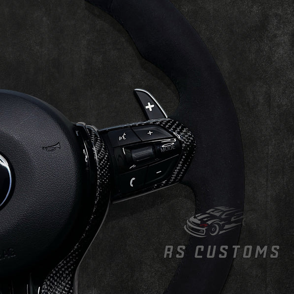 RS Customs BMW F-Series custom steering wheel with full Alcantara, carbon fiber details, integrated LED display, optional complete airbag, heating and paddle shifters.