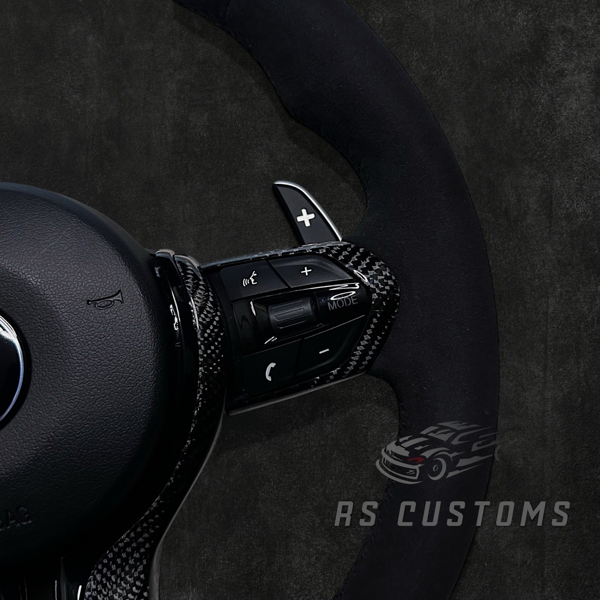 RS Customs BMW F-Series custom steering wheel with full Alcantara, carbon fiber details, integrated LED display, optional complete airbag, heating and paddle shifters.