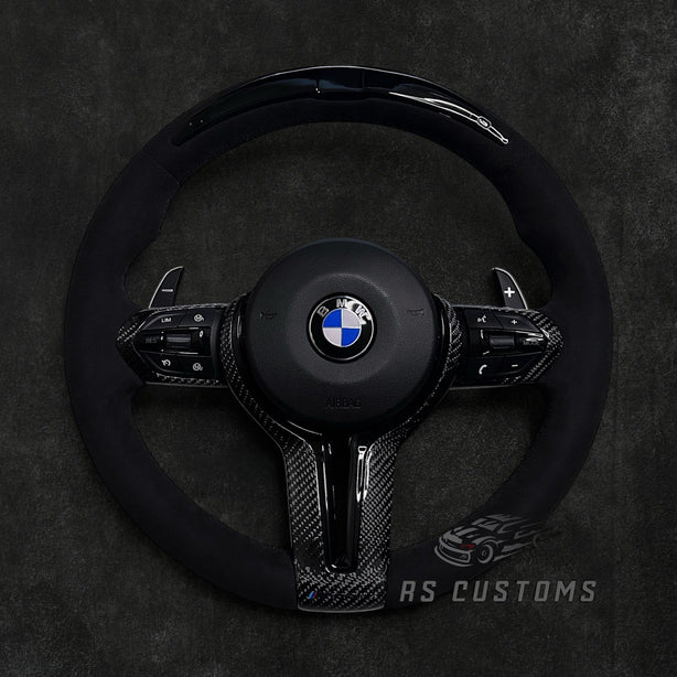RS Customs BMW F-Series custom steering wheel with full Alcantara, carbon fiber details, integrated LED display, optional complete airbag, heating and paddle shifters.