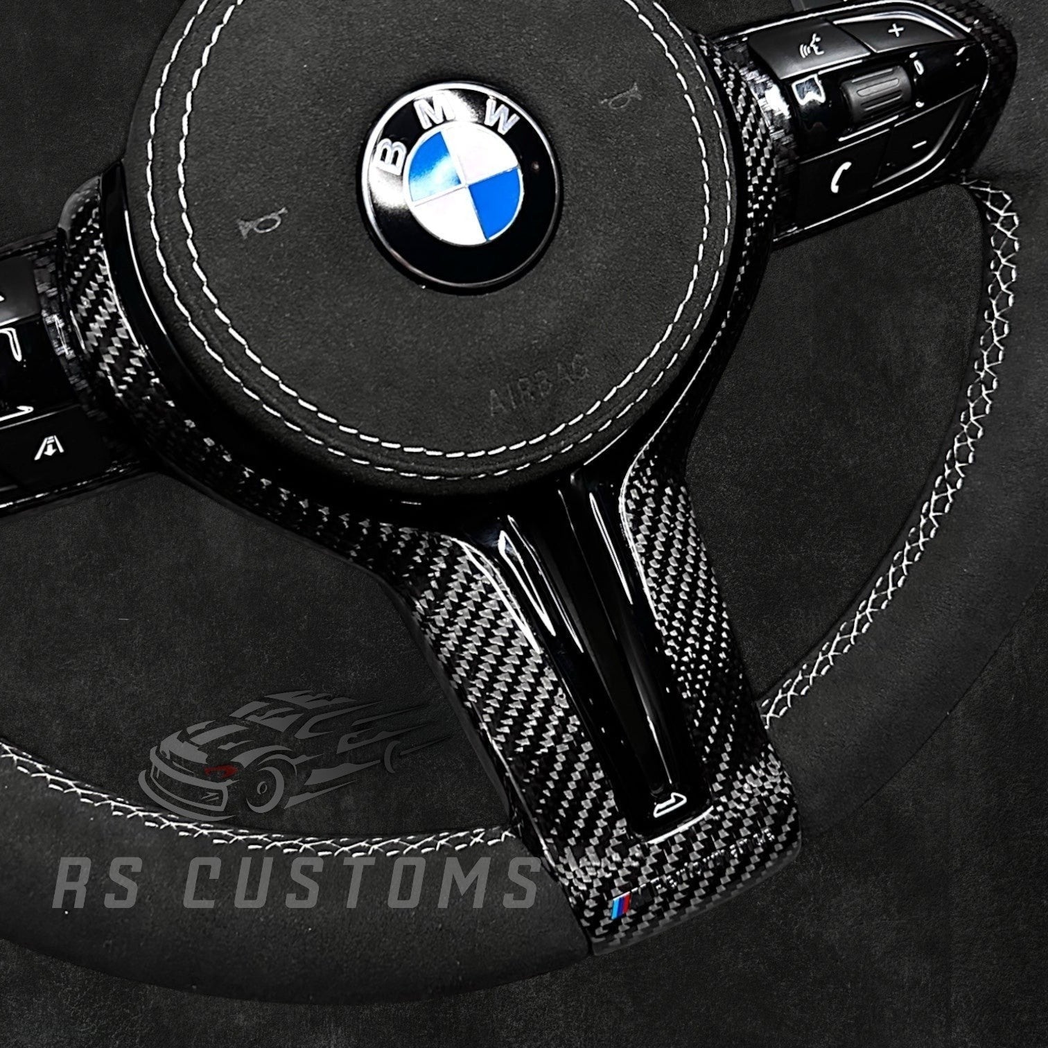 RS Customs BMW F-Series custom steering wheel with full Alcantara, carbon fiber trim, optional complete airbag assembly, multifunction buttons, heating and paddle shifters.