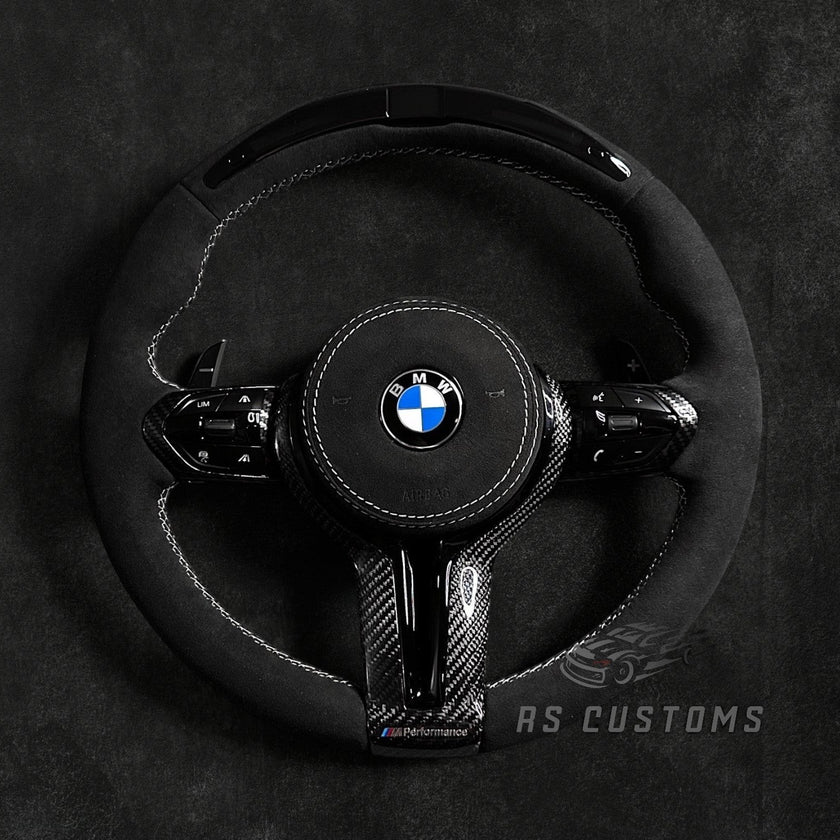 RS Customs BMW F-Series custom steering wheel with full Alcantara, carbon fiber trim, optional complete airbag assembly, multifunction buttons, heating and paddle shifters.