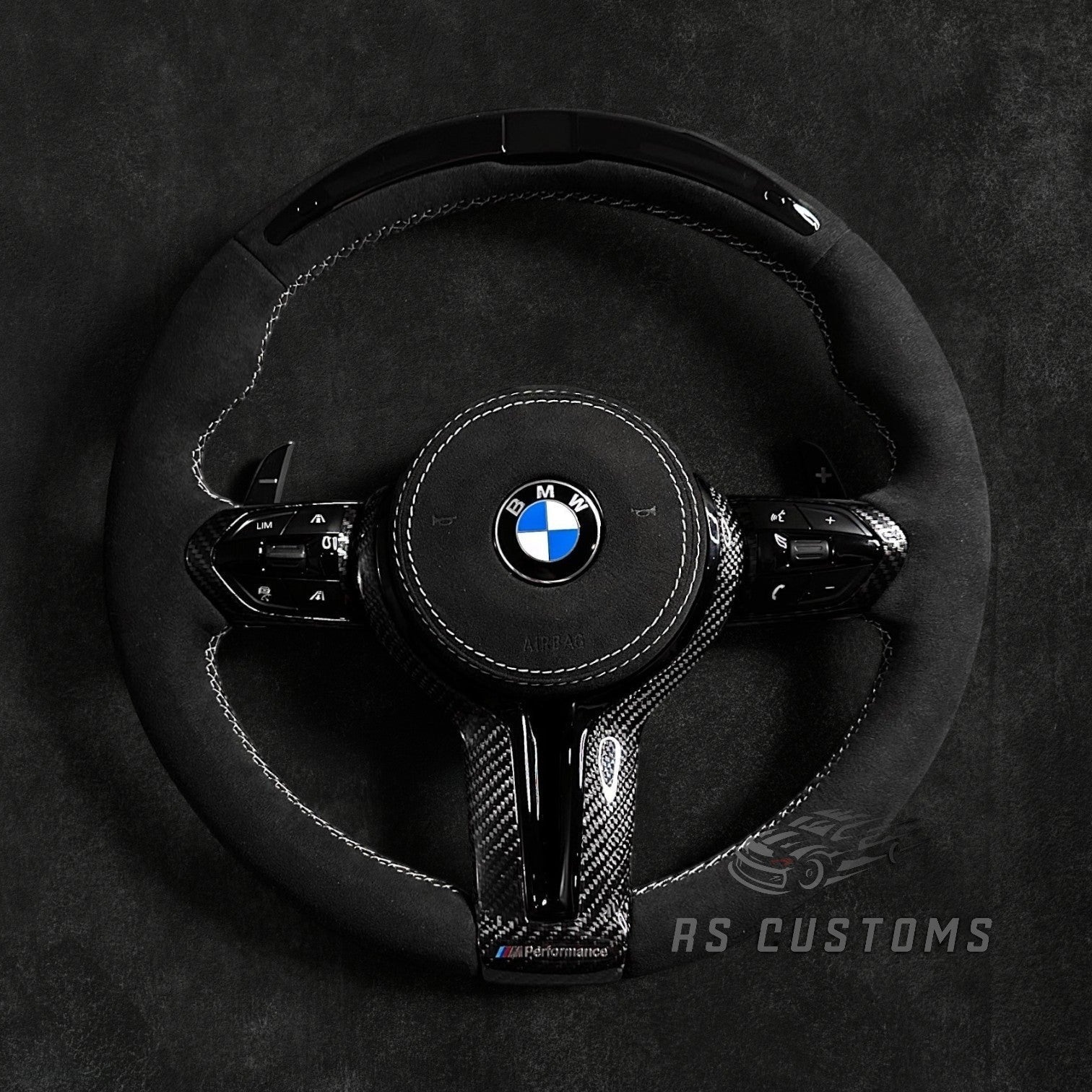 RS Customs BMW F-Series custom steering wheel with full Alcantara, carbon fiber trim, optional complete airbag assembly, multifunction buttons, heating and paddle shifters.