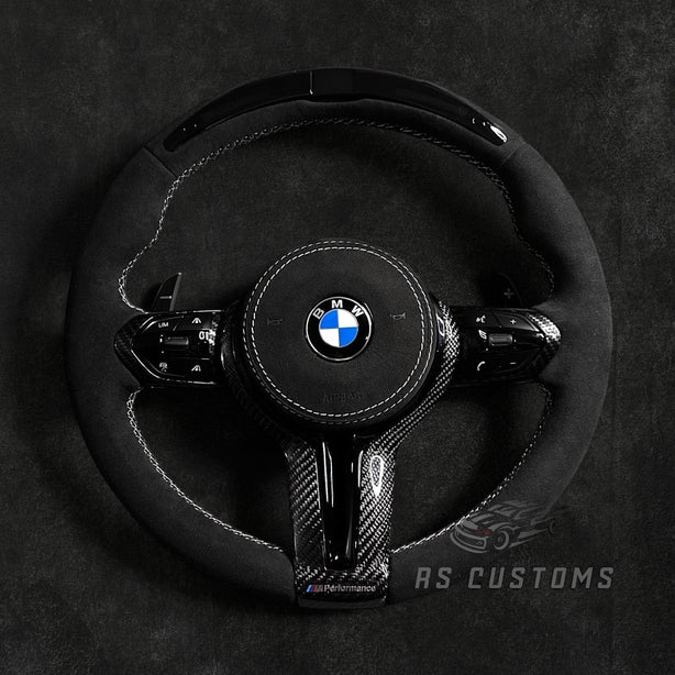 RS Customs BMW F-Series custom steering wheel with full Alcantara, carbon fiber trim, optional complete airbag assembly, multifunction buttons, heating and paddle shifters.