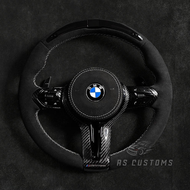 RS Customs BMW F-Series custom steering wheel with full Alcantara, carbon fiber trim, optional complete airbag assembly, multifunction buttons, heating and paddle shifters.