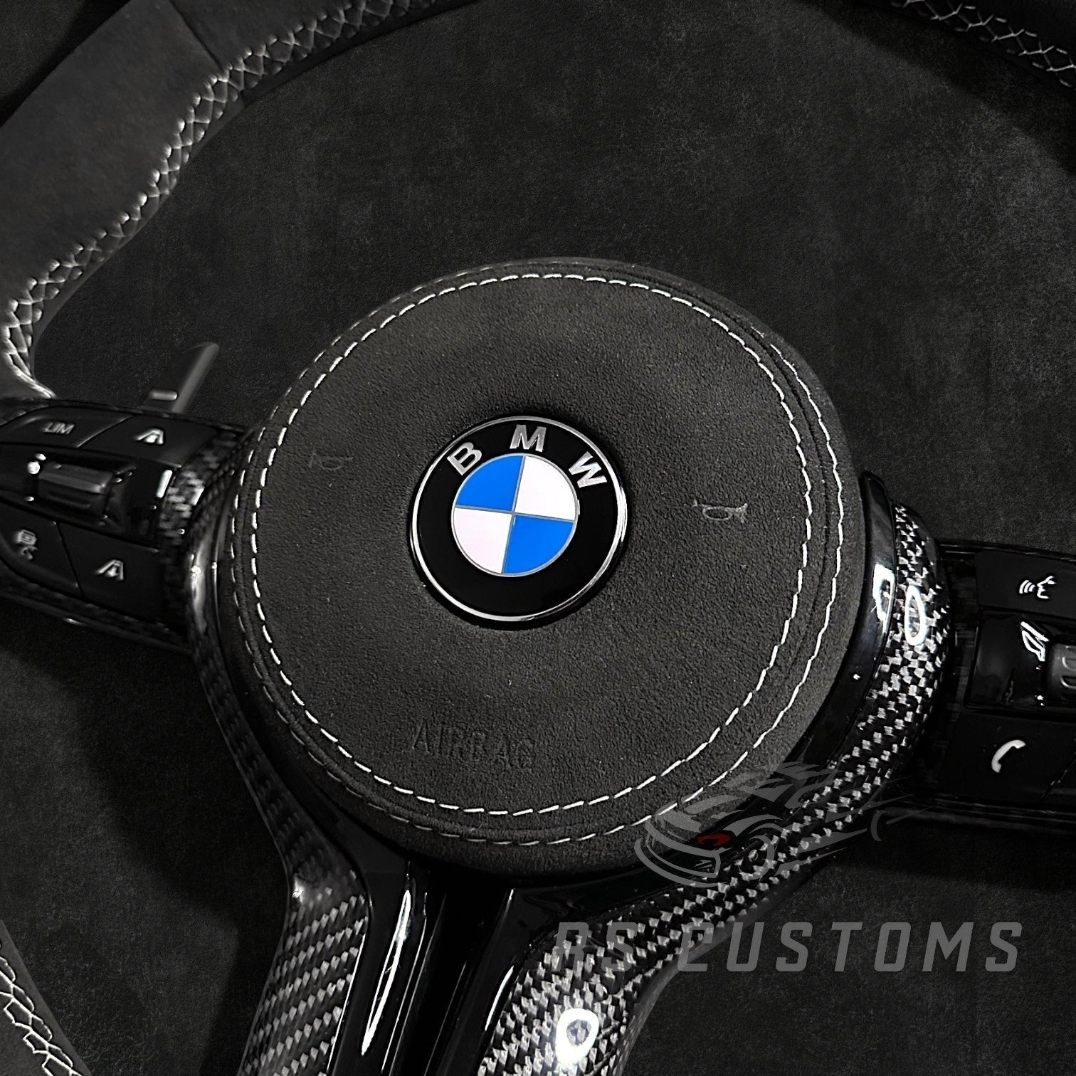 RS Customs BMW F-Series custom steering wheel with full Alcantara, carbon fiber trim, optional complete airbag assembly, multifunction buttons, heating and paddle shifters.