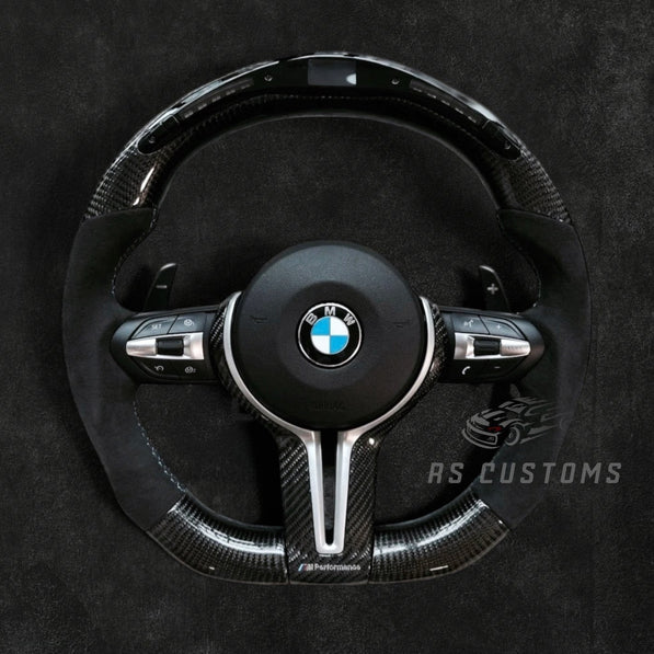 RS Customs BMW F-Series custom steering wheel with carbon fiber, Alcantara grips, integrated LED display, optional heating, paddle shifters and OEM functionality for F-Series BMW models.