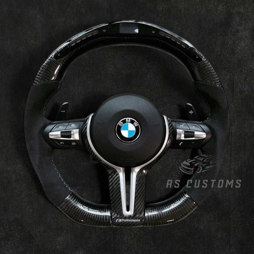 RS Customs BMW F-Series custom steering wheel with carbon fiber, Alcantara grips, integrated LED display, optional heating, paddle shifters and OEM functionality for F-Series BMW models.