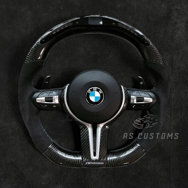 RS Customs BMW F-Series custom steering wheel with carbon fiber, Alcantara grips, integrated LED display, optional heating, paddle shifters and OEM functionality for F-Series BMW models.