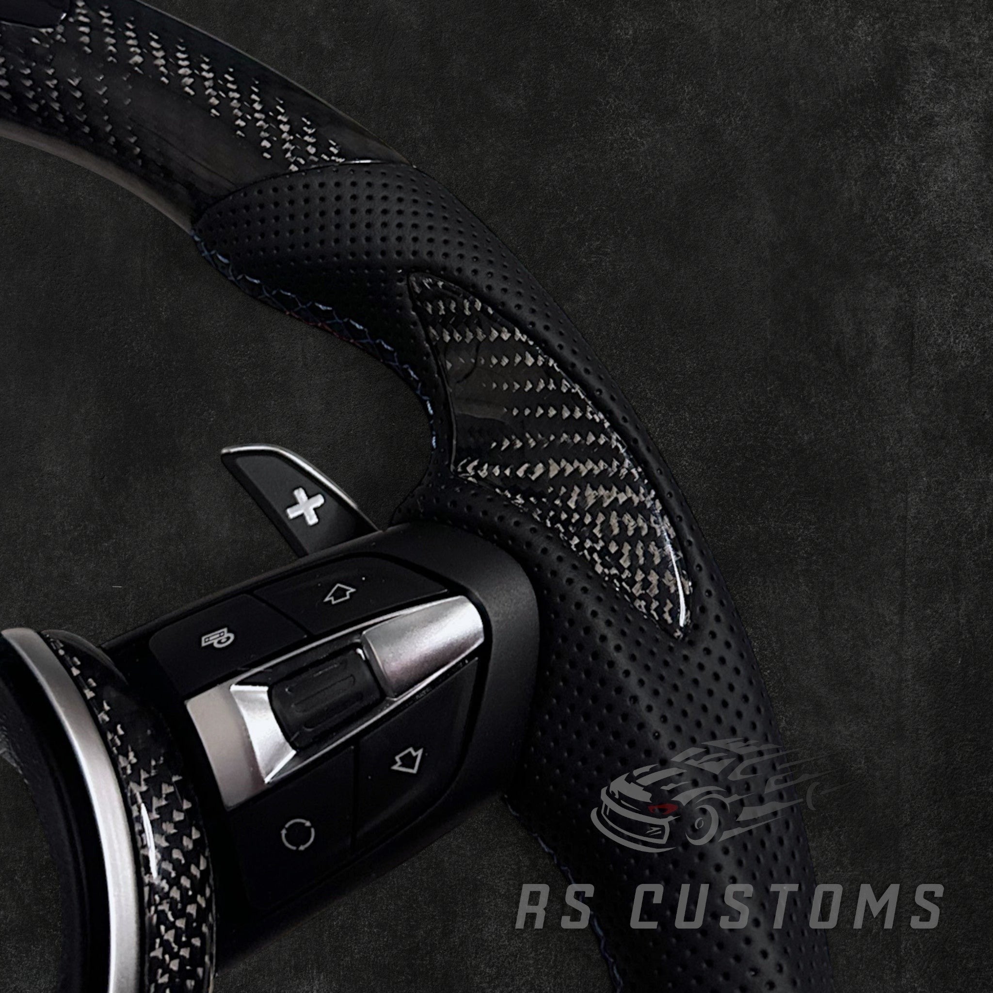 RS Customs BMW F-Series custom steering wheel with carbon fiber, leather grips, integrated LED display, optional complete airbag, multifunction buttons, heating and paddle shifters.
